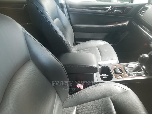 White 2015 Subaru Outback: Spacious SUV with 4WD Performance
