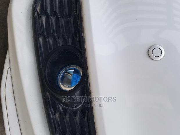 Honda Odyssey 2014 2.4L 2WD Absolute - Classic White: Affordable, Reliable, and Comfortable