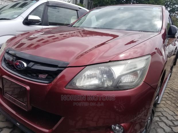 2015 Subaru Exiga in Red: Spacious and Stylish SUV