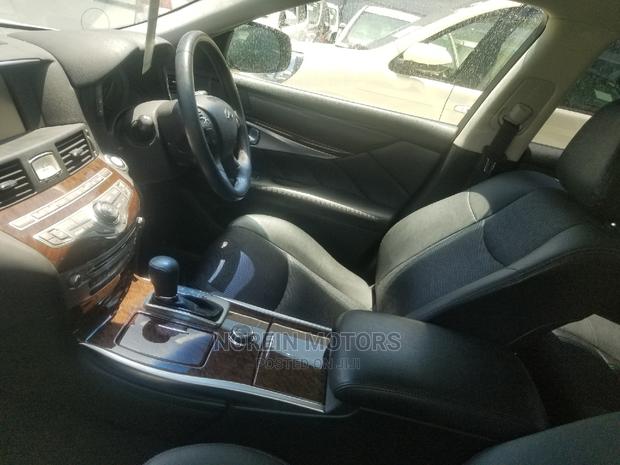 Used 2015 Nissan Fuga White - Affordable Luxury