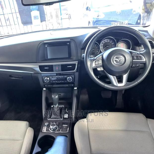 2016.5 Mazda CX-5 Grand Touring FWD - Elegant Red Beauty