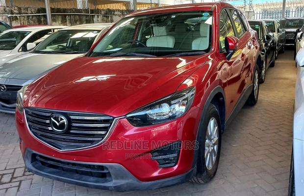 2016.5 Mazda CX-5 Grand Touring FWD - Elegant Red Beauty