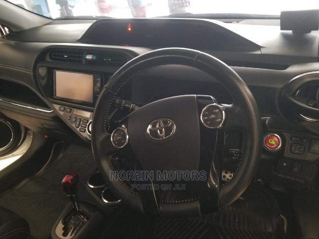 2016 Toyota Aqua White - Compact Hybrid Sedan with Advanced Features