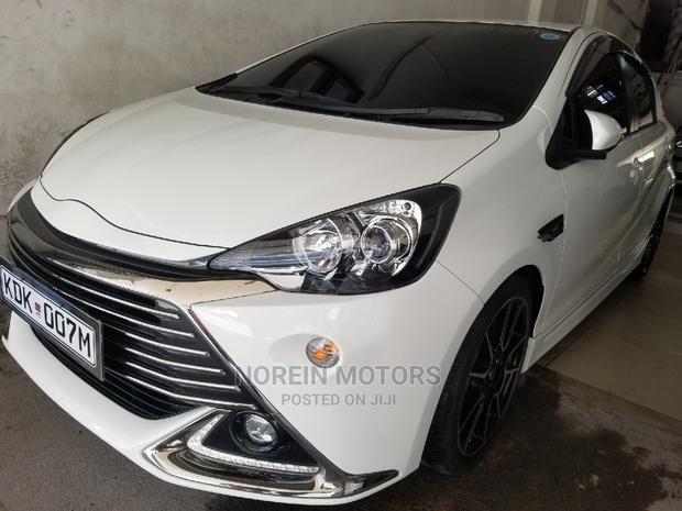2016 Toyota Aqua White - Compact Hybrid Sedan with Advanced Features