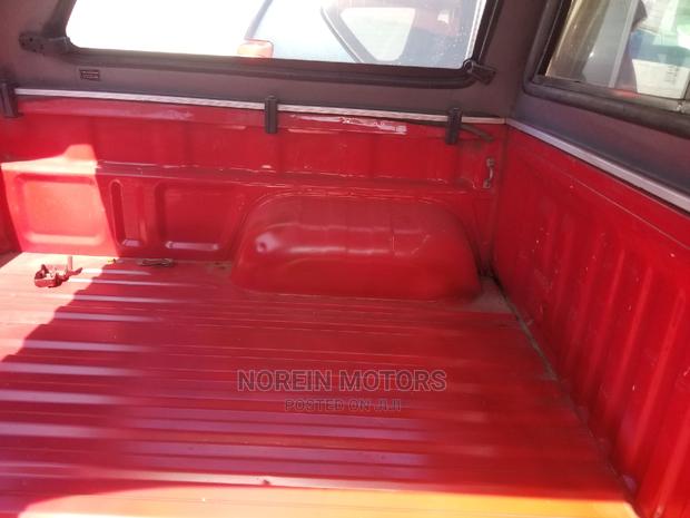 Red 2015 Toyota Hilux WORKMATE - Pre-owned Trucks Available