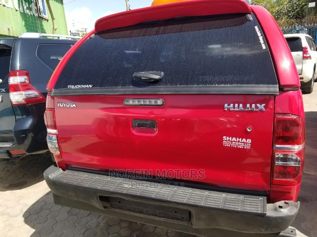 Red 2015 Toyota Hilux WORKMATE - Pre-owned Trucks Available