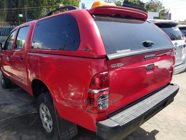 Red 2015 Toyota Hilux WORKMATE - Pre-owned Trucks Available