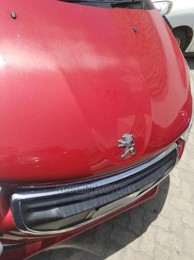 Red 2015 Peugeot 208 - Spacious and Practical Used Car