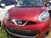 Red 2015 Nissan March: A Compact Car with Charm & Efficiency for sale