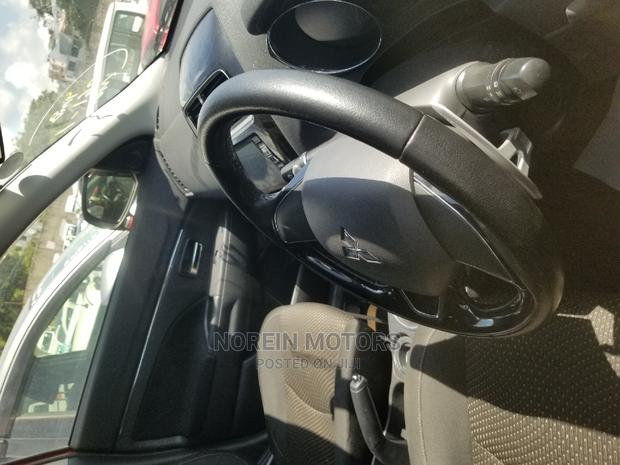 Red Mitsubishi RVR 2016 - SUV for Everyday Adventures