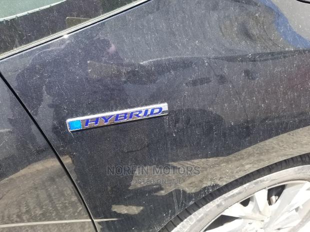 2015 Honda Fit Hybrid 4WD Black - Stylish, Spacious & Fuel-Efficient