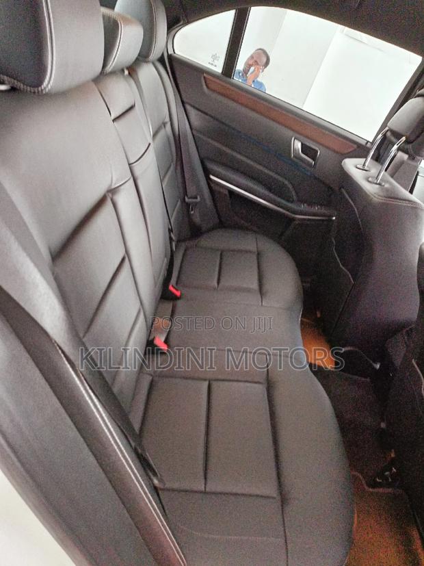 Pre-Owned 2015 Mercedes-Benz E250 in pristine white
