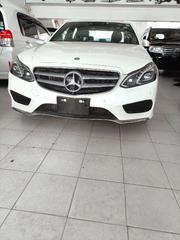 Pre-Owned 2015 Mercedes-Benz E250 in pristine white for sale