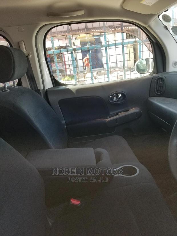 White 2015 Nissan Cube: Compact, Modern, & Ready to Roll