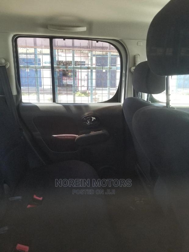 White 2015 Nissan Cube: Compact, Modern, & Ready to Roll