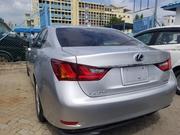 Luxury hybrid sedan with premium features and unparalleled performance, available in silver. for sale