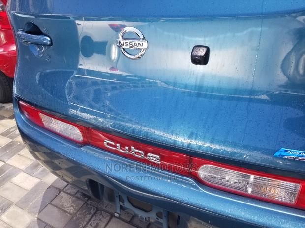 Blue 2015 Nissan Cube: Compact, Efficient, and Stylish