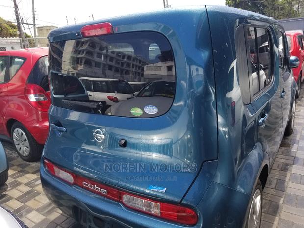 Blue 2015 Nissan Cube: Compact, Efficient, and Stylish