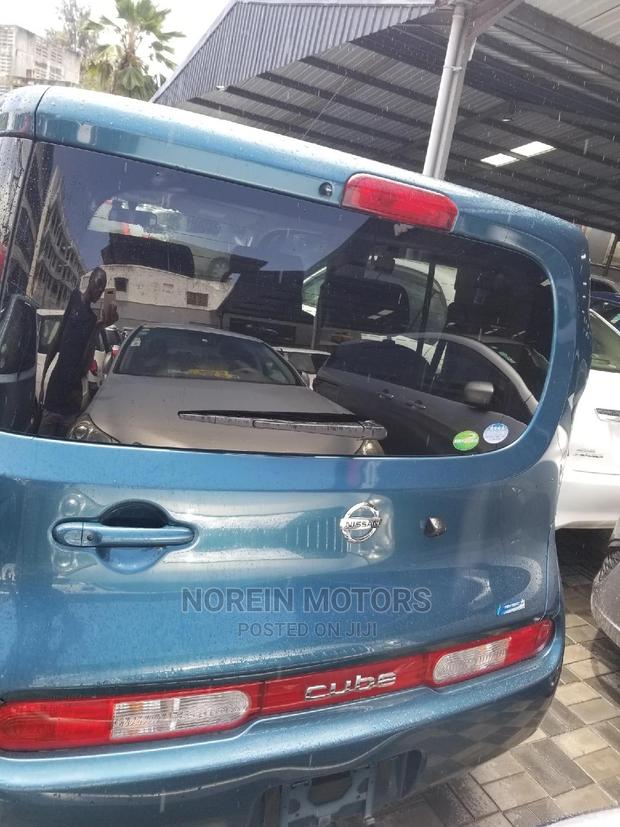 Blue 2015 Nissan Cube: Compact, Efficient, and Stylish