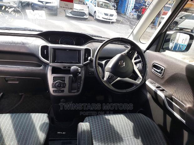 2015 Pink Suzuki Solio: Used Car Listing