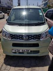Eco-Conscious: 2015 Daihatsu Move Green - Compact, Efficient, and Stylish! for sale