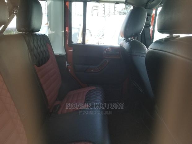 Red 2015 Jeep Wrangler: Power, Style, and Durability