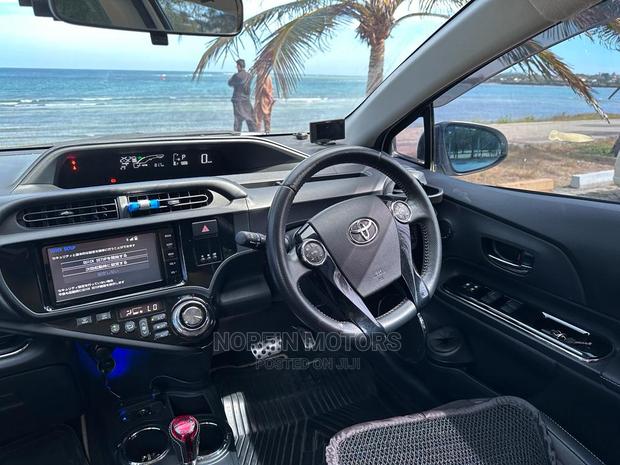 2015 White Toyota Aqua - Used Car Advertisement