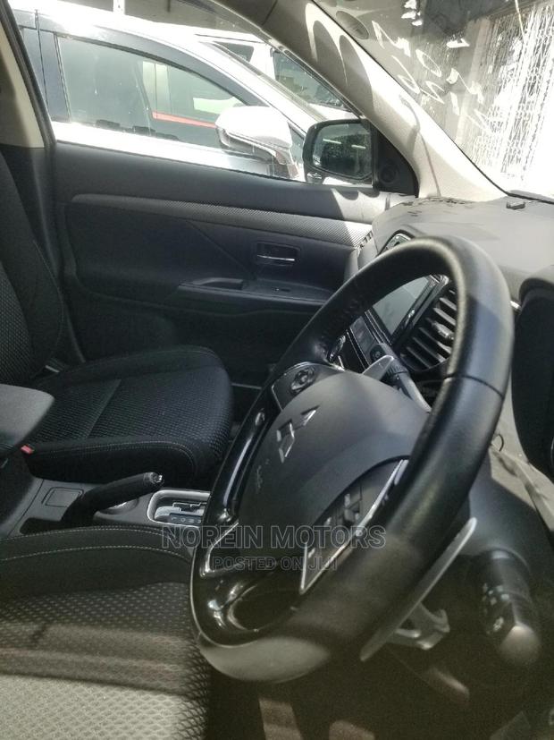 2015 Mitsubishi Outlander in Brown - Luxury and Power in a Brown SUV