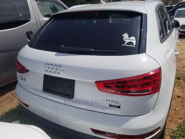 Sleek Audi Q3 2.0 TFSI 180hp: 2015 Model, White, Excellent Performance