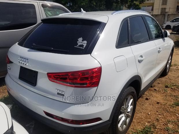 Sleek Audi Q3 2.0 TFSI 180hp: 2015 Model, White, Excellent Performance