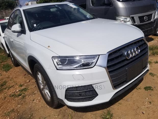 Sleek Audi Q3 2.0 TFSI 180hp: 2015 Model, White, Excellent Performance