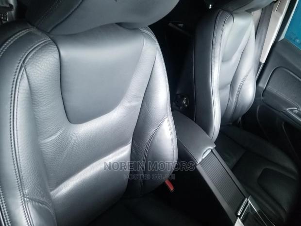 Volvo XC60 2015 in Red: High-End Compact SUV