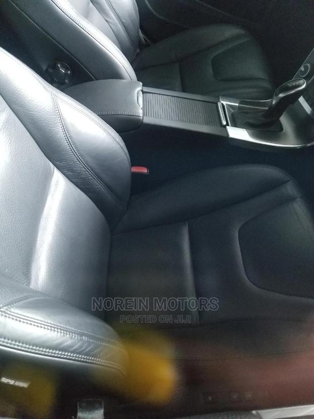 Volvo XC60 2015 in Red: High-End Compact SUV