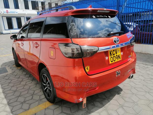 Used 2013 Toyota Wish in Orange: Quality Pre-Owned Sedan for Your Family