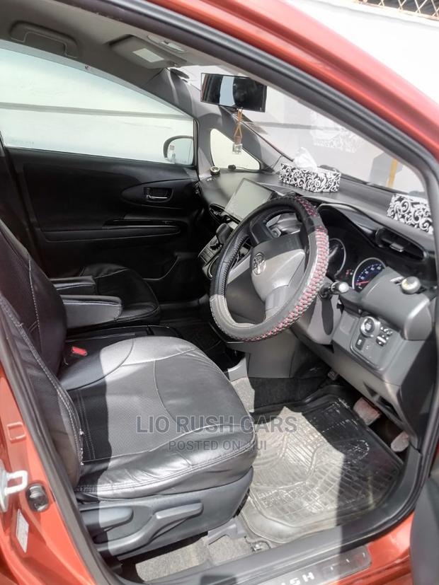 Used 2013 Toyota Wish in Orange: Quality Pre-Owned Sedan for Your Family