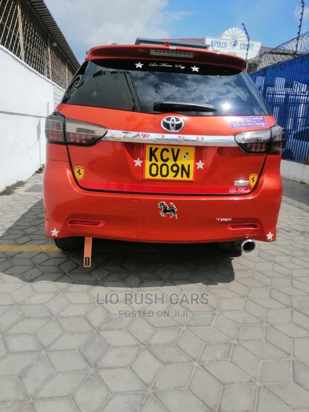 Used 2013 Toyota Wish in Orange: Quality Pre-Owned Sedan for Your Family
