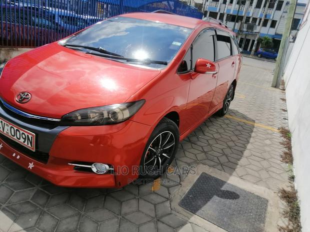 Used 2013 Toyota Wish in Orange: Quality Pre-Owned Sedan for Your Family