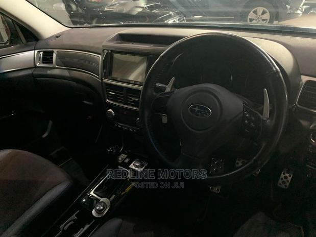 2016 Subaru Exiga Blue - The Perfect Blend of Power and Luxury