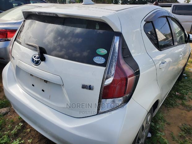 Off White 2015 Toyota Aqua - Stylish and Affordable