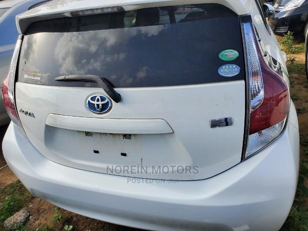 Off White 2015 Toyota Aqua - Stylish and Affordable