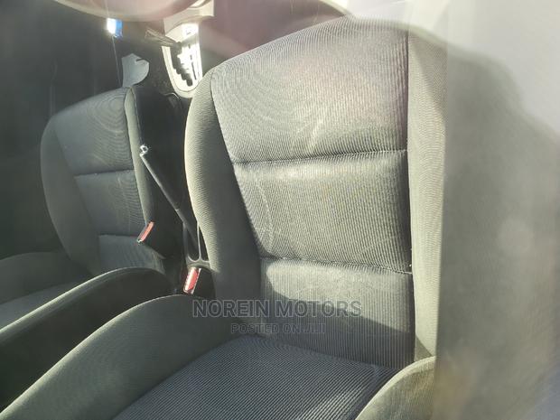 Off White 2015 Toyota Aqua - Stylish and Affordable