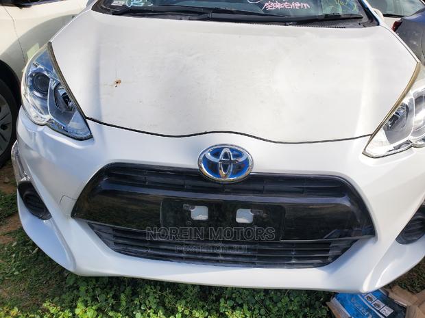 Off White 2015 Toyota Aqua - Stylish and Affordable