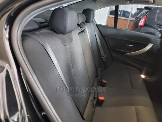 Gray 2015 BMW 320i: Sporty Luxury Car