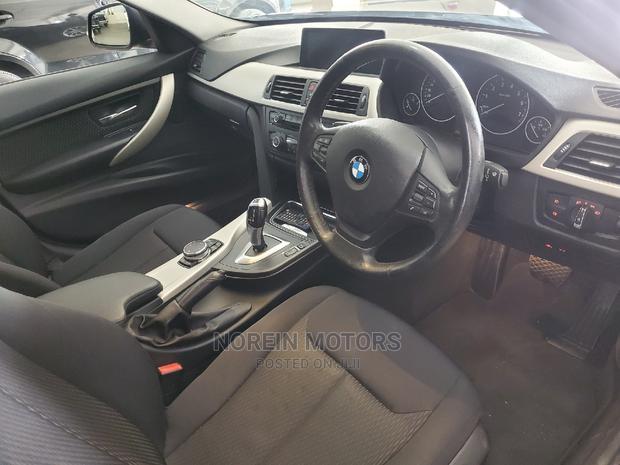 Gray 2015 BMW 320i: Sporty Luxury Car