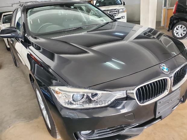 Gray 2015 BMW 320i: Sporty Luxury Car