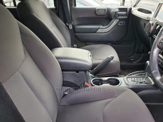 Green 2016 Jeep Wrangler: Rugged and Ready for Adventure