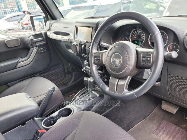 Green 2016 Jeep Wrangler: Rugged and Ready for Adventure