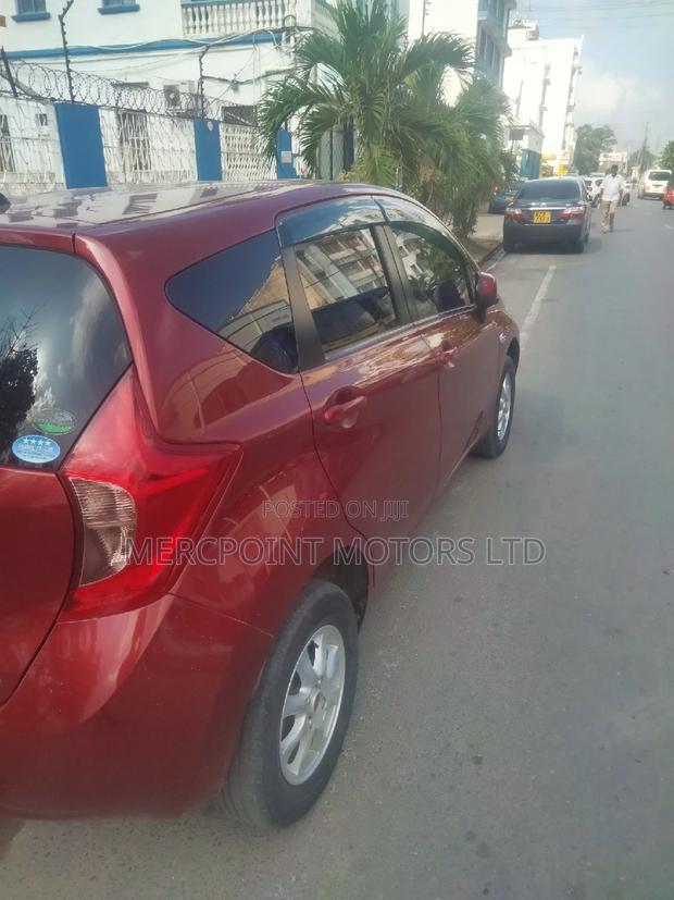 Red Nissan Note 2014: Compact, Stylish, and Economical