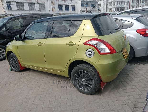 2016 Green Suzuki Swift - Compact, Stylish, and Efficient