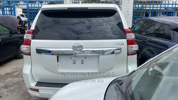 2016 Toyota Land Cruiser Prado White: The Perfect Balance of Power & Comfort